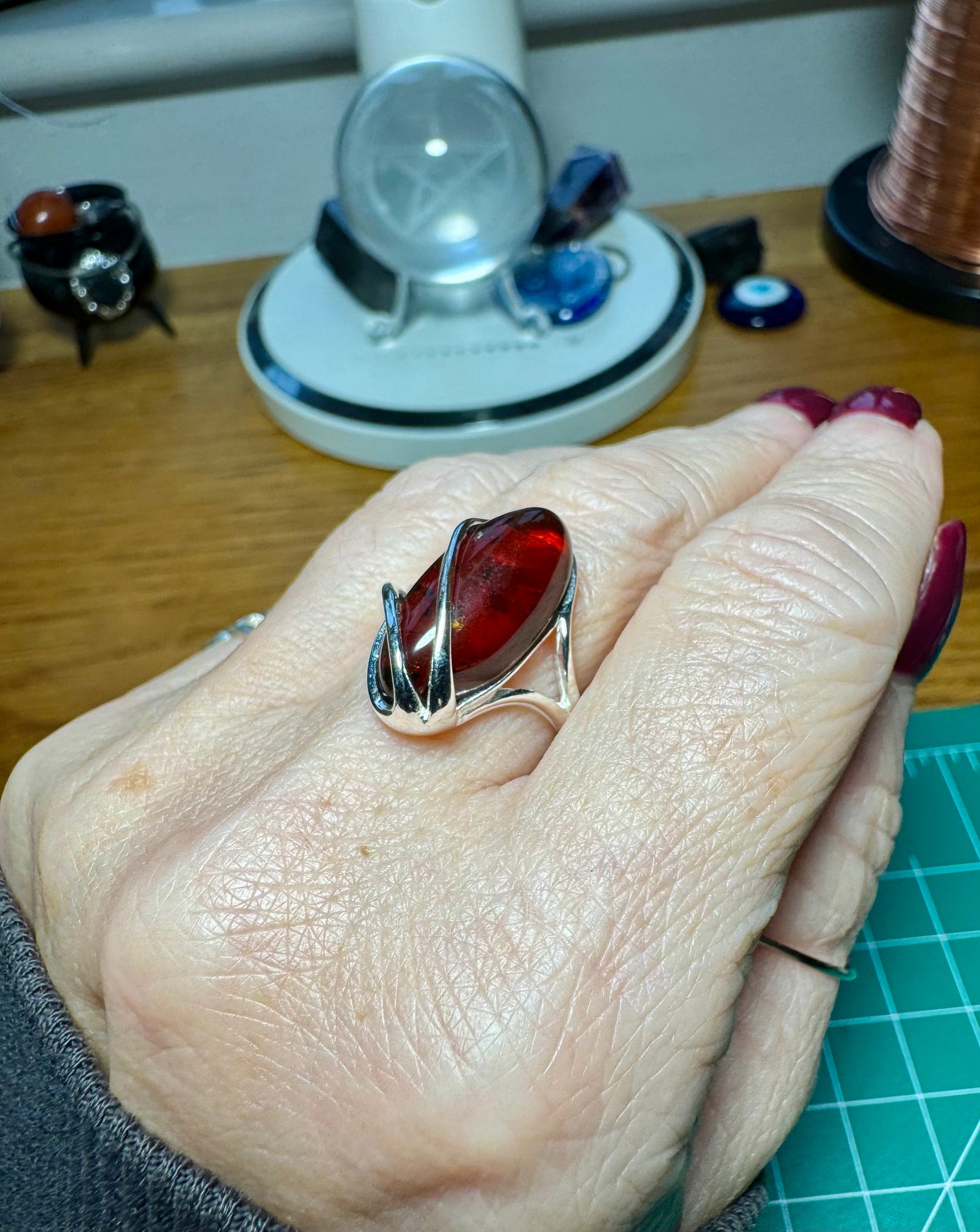 CHERRY AMBER AND STERLING SILVER ADJUSTABLE RING