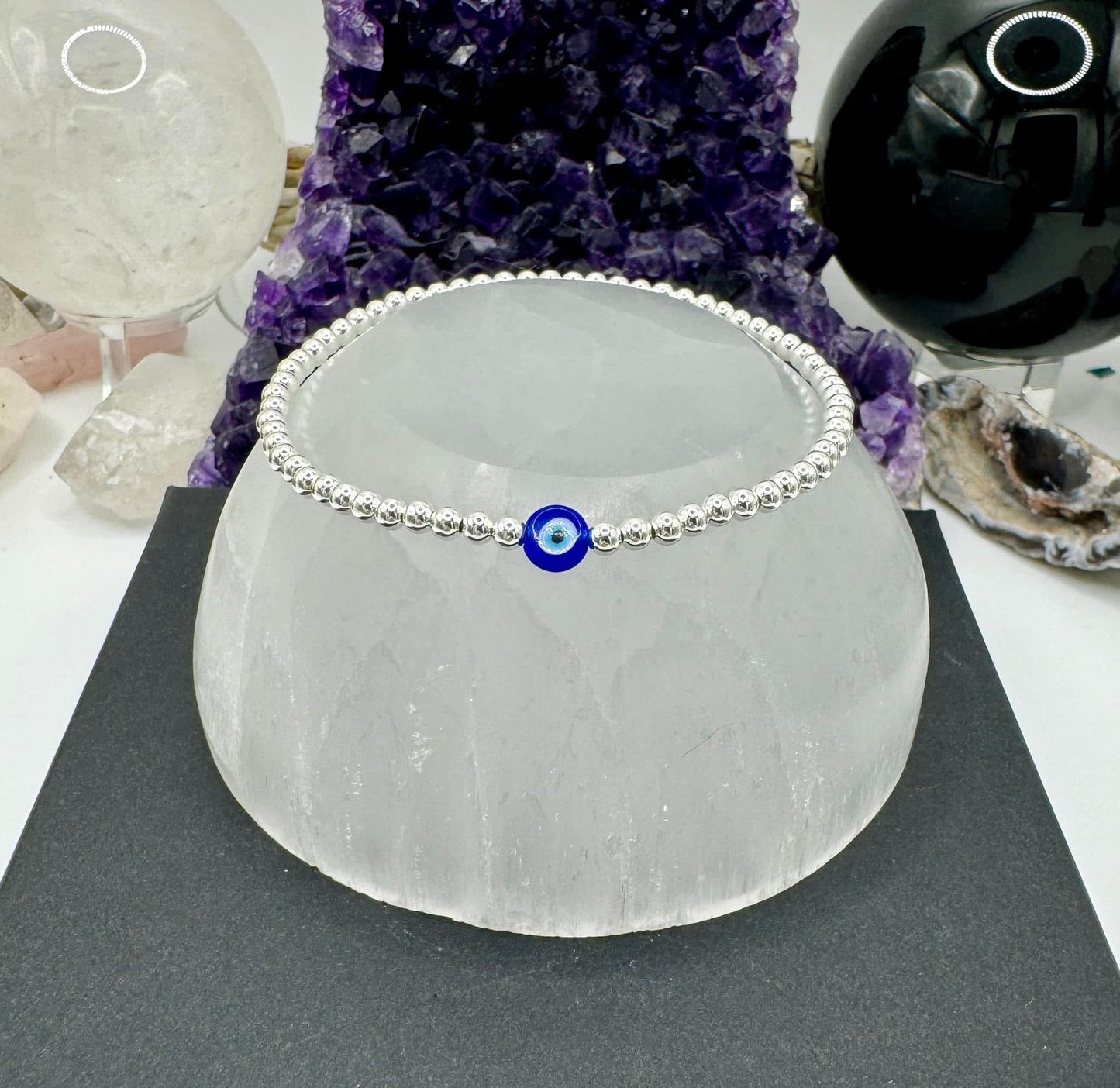 BLUE EVIL EYE AND STERLING SILVER BRACELET