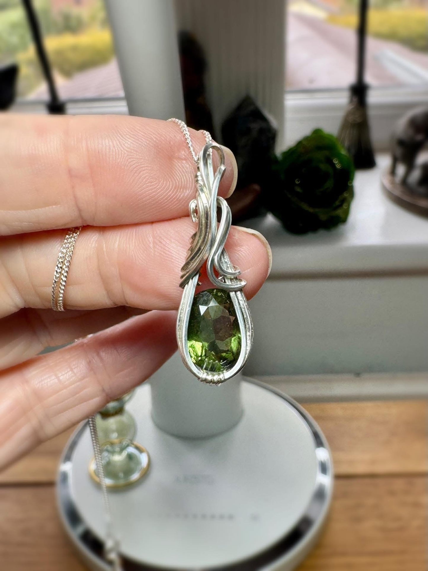FACETED MOLDAVITE AND STERLING SILVER NECKLACE