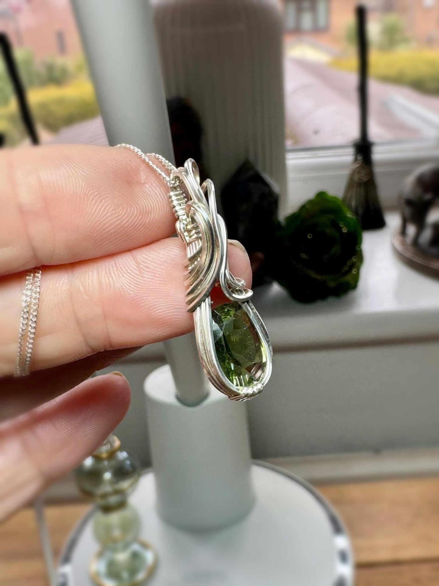 FACETED MOLDAVITE AND STERLING SILVER NECKLACE