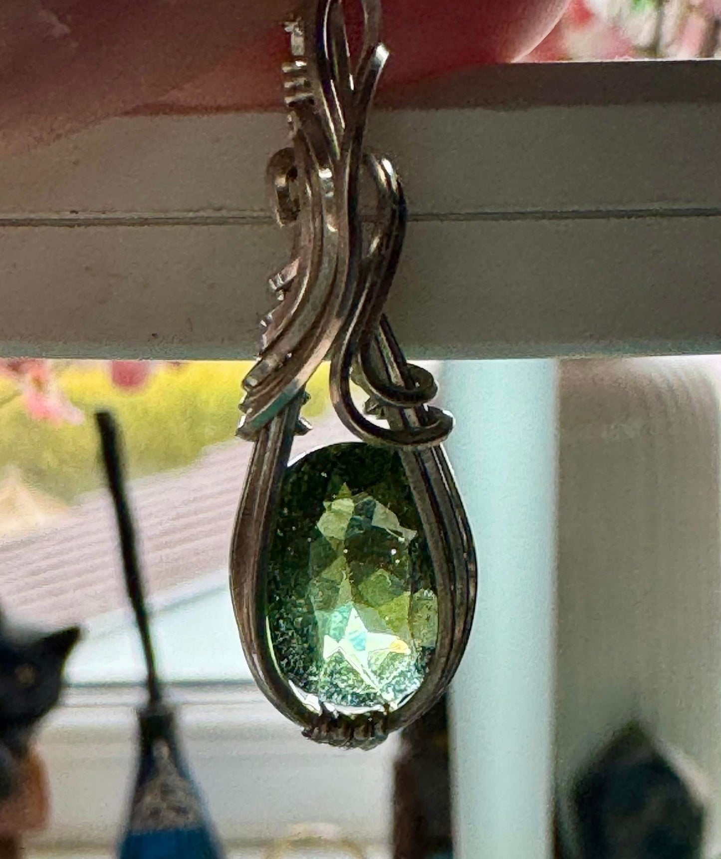FACETED MOLDAVITE AND STERLING SILVER NECKLACE