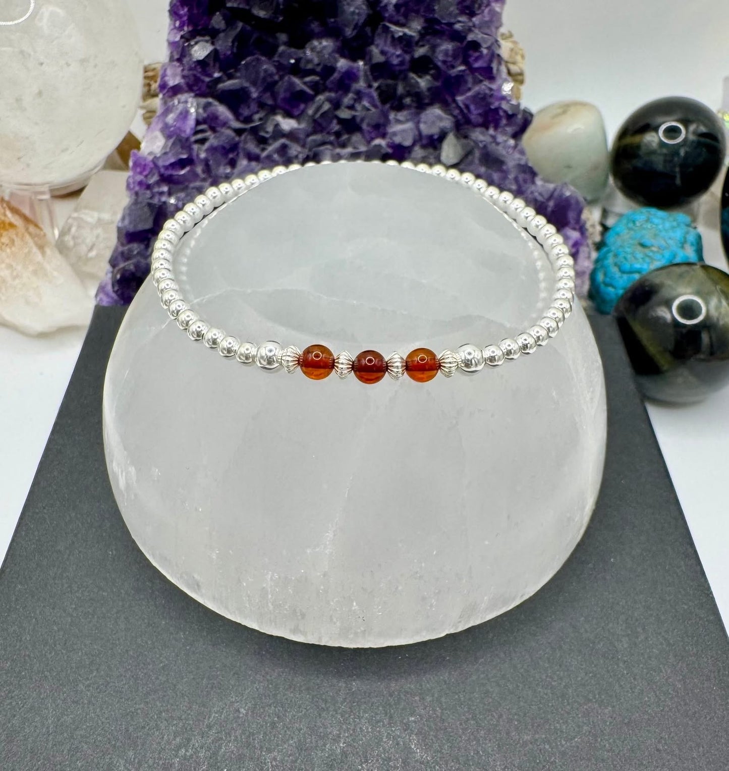 COGNAC AMBER AND STERLING SILVER BRACELETS