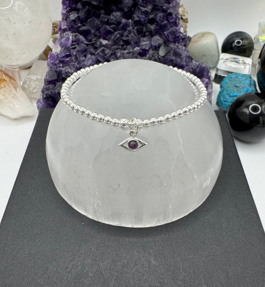 STERLING SILVER EYE BRACELET WITH AMETHYST
