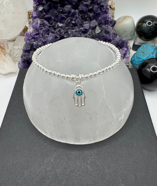 STERLING SILVER HAMSA HAND WITH EVIL EYE BRACELET