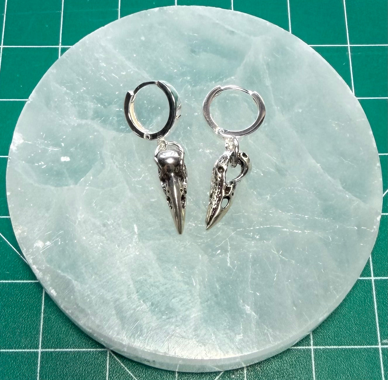 STERLING SILVER RAVEN SKULL HUGGIE EARRINGS
