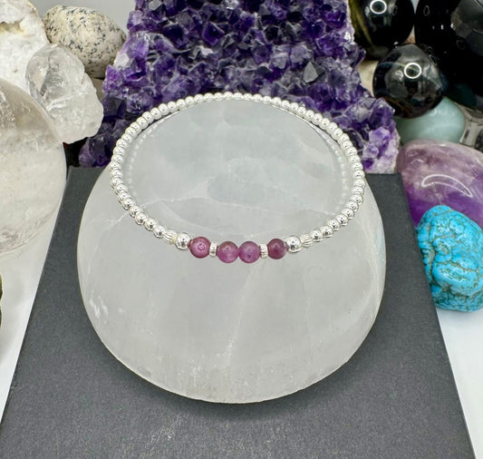 STAR RUBY AND STERLING SILVER BRACELETS
