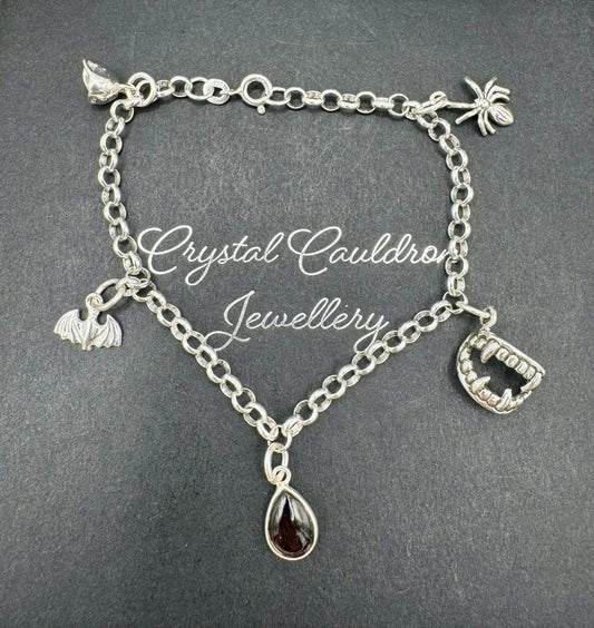 GOTHIC CHARM BRACELET WITH GARNET