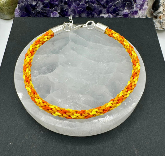 CORD AND STERLING SILVER BRACELET