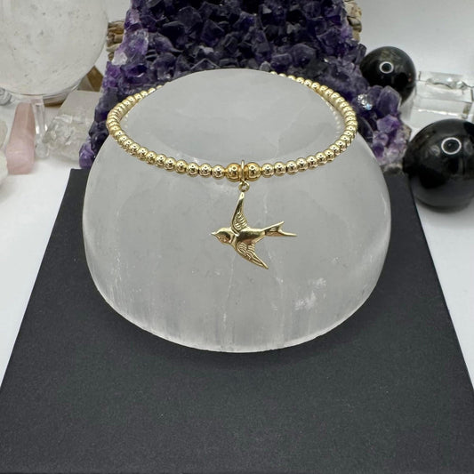 YELLOW GOLD SWALLOW BRACELET