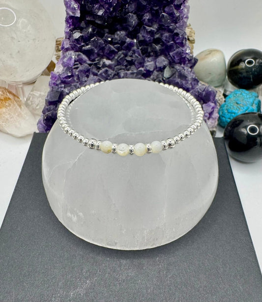 MOTHER OF PEARL AND STERLING SILVER BRACELETS